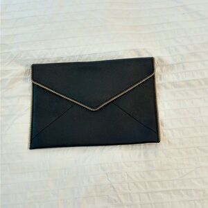 Rebecca Minkhoff Leo Envelope Clutch in black leather.